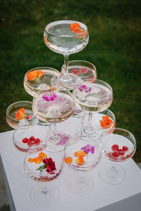 Spring Wedding Drink Tower Flowers Glasses Victoria Sponge Photography #wedding #springwedding Pretty Wedding Drinks, Flowers In Drinks, Spring Garden Wedding Aesthetic, Cocktail Flowers Wedding, Cocktail Wedding Styling, Themed Cocktails Party Ideas, Colorful Garden Party Wedding, Wedding Ideas Colourful, Cocktail With Flowers