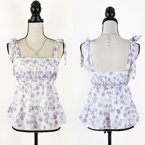 This Sweet Baby Doll Top Is Just The Style You Need For Sunny Weather! It Features Tie Ribbon Straps, An Empire Waist, And A Pleated Bust, All In A Pretty And White Floral Pattern. Pair It With Your Favorite Lace Skirt Or Shorts For A Romantic Summery Look. Nwt. Specifications 100% Cotton Self 100% Rayon Lining Adjustable Ribbon Tie Straps Elastic Empire Waist Made In China Hand Wash Cold; Do Not Bleach; Hang To Dry; Dry Clean For Best Results Measurements Bust - Small: 34” | Medium: 36" | Large Empire Line Top, Empire Cut Tops, Empire Waist Shirt, Baby Doll Top Pattern, Empire Waist Top, Self Made Clothes, Baby Doll Top, Babydoll Top Pattern, Babydoll Top Outfit