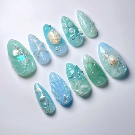 🩵 Aquamarine 🪸 I wanted to create a vibe that makes you think of the ocean 🐠 custom design for my own press ons to wear this summer with my favourite blue+green shades 🫧 you can place an order for press ons at janetsnails.com ✨ #naildesign #3dnailart #3dnails #summernails #nailinspo #gelxinspo #chromenails #fairycorenails #mermaidnails #shellnails #beachnails #naturenails #nails2inspire #pressonnails #pressons #vancouvernails #gelxnails Turquoise Mermaid Nails, Green Ocean Nails, Blue Green Summer Nails, Green And Blue Nail Ideas, Blue Green Nail Art, Aquamarine Nails Design, Green Beach Nails, Blue Green Nails Designs, Blue And Green Nails Designs