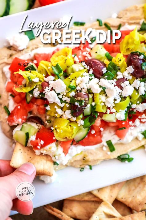 This is THE BEST DIP RECIPE EVER! This easy layered greek dip is quick to make, requires no cooking, and people rave about it every time it is served. It is kind of like a seven layer greek dip where all of the ingredients are layered on top of each other to form a fresh, healthy party dip perfect for an appetizer or neighborhood BBQ. Serve this easy greek layer dip with fresh pita or chips. Layered Greek Dip, Greek Dip Recipes, Party Appetizer Dips, Greek Layer Dip, Best Dip, Best Dip Recipes, Layered Dip Recipes, Greek Dip, Seven Layer Dip