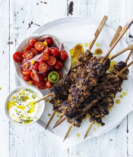 Neil Perry's spicy lamb skewers with cucumber yoghurt Recipe | Good Food Cumin Lamb, Yoghurt Recipe, Grilled Flatbread, Lamb Skewers, Neil Perry, Lamb Dishes, Bbq Picnic, Perfect Picnic, Lamb Recipes