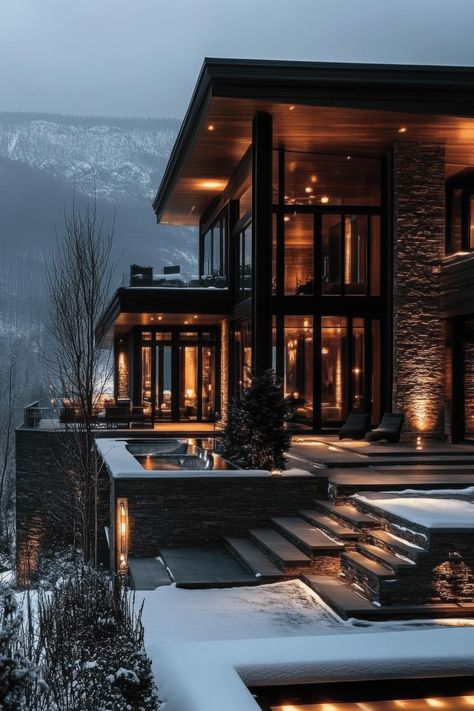 Transform your living room into a cozy, luxurious retreat with these modern winter design ideas. Dark House Interior Design Living Room, Mountain Home Modern, Cozy Living Room Winter, Modern House In Snow, Big Living Room With Fireplace, Winter House Aesthetic, Step Down Living Room Ideas, Luxury House Inside, Luxury Winter Cabin