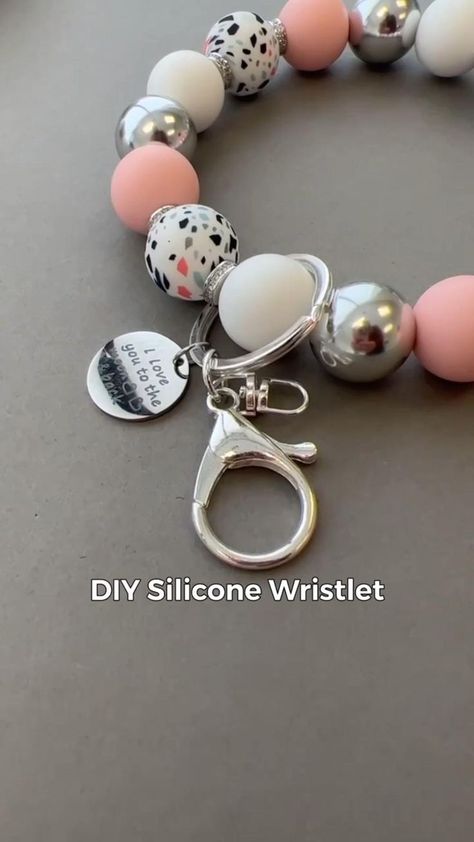 Glass Stone Magnets How To Make, Fundraiser Craft Ideas, How To Make Silicone Bead Keychain Bracelet, Diy Silicone Wristlet Keychain, Wrist Keychain Bracelets Diy, How To Make A Silicone Bead Wristlet, How To Make Rubber Bead Keychain, Key Chains To Make And Sell, Diy Bead Wristlet Keychain