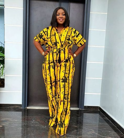 30+ stylish Ankara jumpsuit styles you should consider. - Stylish Naija Traditional Jumpsuit African Prints, Adire Jumpsuit Styles, Jumpsuit With Ankara, Ankara Short Trouser And Top, Palazzo Jumpsuit Outfit Classy, Ankara Palazzo Jumpsuit, Ankara Jumpsuits For Women Casual, Jumpsuit Ankara Styles, Ankara Jumpsuits For Women Classy