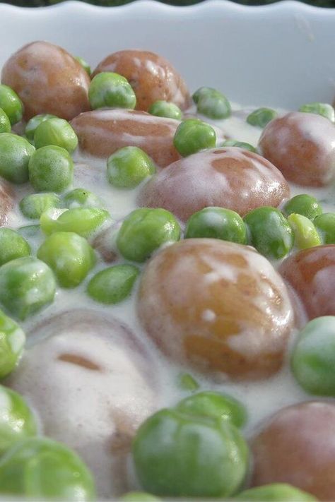 Creamed Peas and New Potatoes | "This recipe was a perfect rendition of the old time dish my grandma used to make me growing up on the farm." #sidedishrecipes #sides #dinnersidedish #sidedishes #sidedishideas #potatoes #potatorecipes #potatosidedish Peas And New Potatoes, Potatoes And Peas Recipe, Creamed Peas And Potatoes, Potato Recipes Crockpot, Spring Potato, Potatoes And Peas, Yummy Vegetable Recipes, Fresh Peas, Creamed Peas