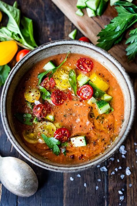 Learn the secret to making the BEST Gazpacho! This quick and easy recipe for Gazpacho highlights ripe and juicy summer tomatoes. Vegan and gluten-free with several variations!  #gazpacho #coldsoup #vegansoup Spanish Soup, Feasting At Home, Gazpacho Soup, Gazpacho Recipe, Cold Soup, Summer Tomato, Juicy Tomatoes, Goulash, Vegan Soup