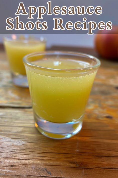 Applesauce Shots are a fun and fruity cocktail that combines the sweet and tangy flavors of apple and pineapple with a spicy kick. Made with Apple Pucker, pineapple juice, Fireball cinnamon whiskey, and hard apple cider, these shots are perfect for parties or casual gatherings. Shots With Pineapple Juice, Fireball And Pineapple Juice, Applesauce Shot, Apple Shots, Apple Pucker, Alcoholic Punch Recipes, Cinnamon Whiskey, Fruity Cocktail, Hard Apple Cider