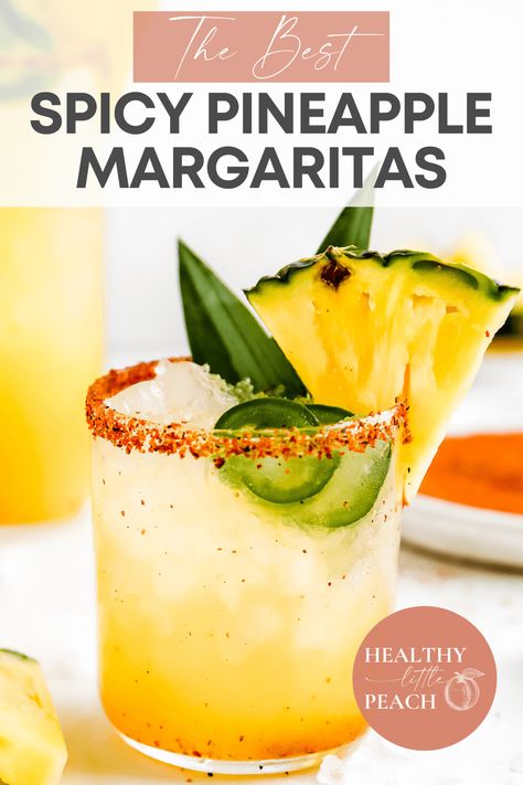 The perfect Spicy Pineapple Margarita that's great for any occasion. This drink is filled with tequila, lime, pineapple, and jalapeno juice, jalapenos slices, rimmed with Tajin seasoning. The perfect balance of savory and sweet. #pineapplemargarita #spicymargaritas #cocktails #cocktailrecipes #happyhour Pineapple Margarita Pitcher, Pinapple Margarita, Spicy Pineapple Margarita, Big Batch Cocktails, Pineapple Margaritas, Margarita Pitcher, Pineapple Margarita Recipe, Spicy Margarita Recipe, Spicy Pineapple