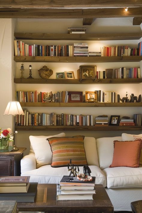 Floating Shelves Media Wall, Library Organization Ideas Home, Full Wall Bookshelves, Bookshelves On Wall, Modern Library Design Home, Bookshelf Behind Couch, Full Wall Shelving, Modern Shelving Ideas, Shelving Unit Ideas