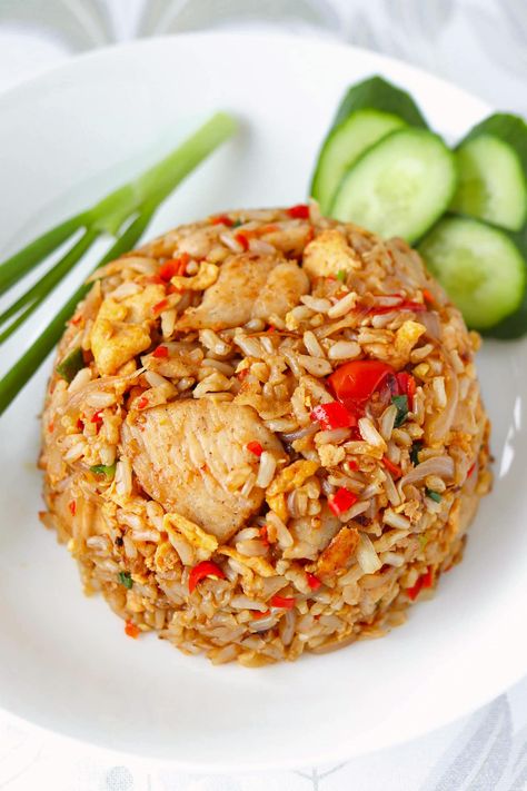 Learn how to make Thai Fried Rice (Khao Pad) the authentic way like they do in Thailand and at Thai restaurants! It’s quick and easy to make in under 30 minutes, high in protein thanks to chicken and eggs, and full the BEST spicy, savory and sweet flavors! Perfect for busy weeknights and better than takeout! #thaifood #friedrice #dinner #stirfry #mealprep #thairecipes #highproteinmeals #highprotein #onewokwonder #easyrecipes | That Spicy Chick Thai Spicy Fried Rice, Traditional Thai Recipes, Thai Fried Rice Recipe Authentic, Spicy Chicken Fried Rice Recipe, Thailand Food Recipes, Thai Rice Recipes, Thai Fried Rice Recipe, Fried Rice Thai, Thai Chicken Fried Rice