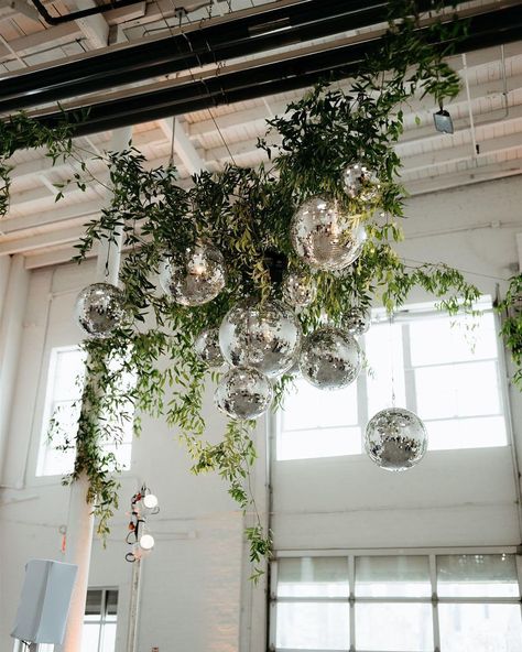 Hanging greenery and mirror balls above your dance floor looks more chic!! 🤍🖤 Planning @awebykerry Photo @forgedinthenorth Mirror ball a… | Instagram Hanging Greenery, Nyc Florist, Hanging Wedding Decorations, Wedding Mirror, Nye Wedding, Dance Floor Wedding, Foliage Wedding, One Flower, Ball Decorations