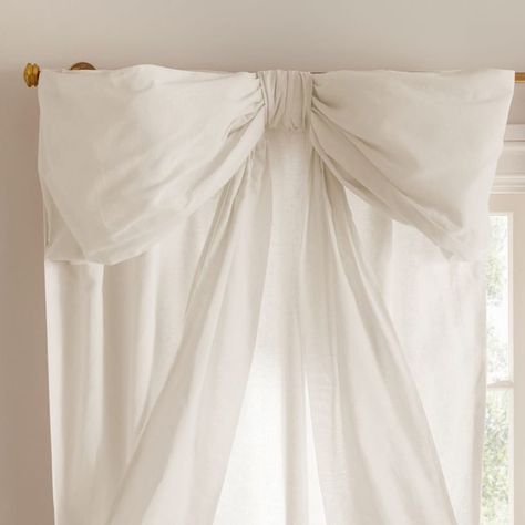 Durable construction meets sweet design in this blush-pink curtain. The oversized bow updates a classic silhouette and lends an enchanting aesthetic to their bedroom or nursery. Designed exclusively for Pottery Barn Teen by lifestyle brand LoveShackFancy. By choosing our cotton products, you're supporting our investment in Better Cotton's mission. This product is sourced via mass balance and therefore may not contain Better Cotton. Learn more at bettercotton.org/massbalance Made in a Fair Trade Certified(TM) factory, supporting fair and safe labor practices and empowering workers to invest in their communities. Workers receive extra funds for every product sold which are used for community projects chosen by workers. Woven of 55% linen and 45% cotton. Our curtain's 2-in-1 construction offe Pottery Barn Love Shack Fancy, Feminine House Decor, Pottery Barn Girls Room, Bow Home Decor, Pink Toile Nursery, Preppy Curtains, Light Pink And White Bedroom, Cute Curtains Bedroom, Fun Drapery