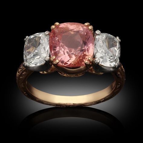 Hancocks 4.16ct Cushion Padparadscha Sapphire And Old Mine Cushion Diamond Three Stone Ring | BADA