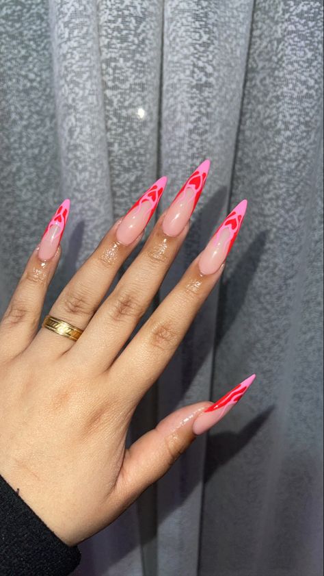 Long Oval Valentines Nails, Valentines Nail Set Almond, Valentines Stilletos Nails, Valentines Nails Acrylic Stiletto, Long Almond Valentines Nails, Stilleto Nails Pink And Black, Long Almond Nails Valentines Day, Heart Flames Nails, Hot Pink Nails Stiletto