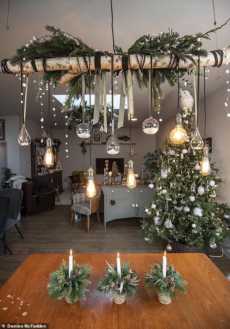 Christmas Diy Farmhouse, Hanging Centrepieces Christmas, Hanging Christmas Table Decorations, Christmas Hanging Ceiling Decorations, Over Table Hanging Decorations Diy, Christmas Lights In The Living Room, Christmas Light Ceiling Decor, Christmas Ceiling Light Decorations, Christmas Light Chandelier Diy