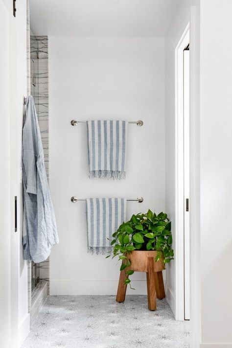 bathroom with towel bars stacked Stacked Towel Bars, Towel Bar Placement, Towel Bars In Bathroom Ideas, Bathroom Towel Bar Ideas, Towel Bars In Bathroom, Bathroom Towel Hanging Ideas, Interior Design Boutique, Guest Bathroom Towels, Hang Towels In Bathroom