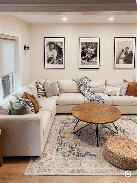 Living room decor. Round wooden coffee table, blue and white floral area rug with a light beige couch. Oversized black gallery prints. Jute floor cushion and brown, blue and green cushion covers. 

Follow my shop @thesamesstyle on the @shop.LTK app to shop this post and get my exclusive app-only content!

#liketkit #LTKunder100 #LTKstyletip #LTKhome
@shop.ltk
http://liketk.it/3qvd2 Beige Couch Living Room, Beige Living Room Decor, Ruang Tv, Beige Couch, Beige Living Rooms, Brown Living Room, Blue Living Room, Decor Home Living Room, Living Room Decor Apartment