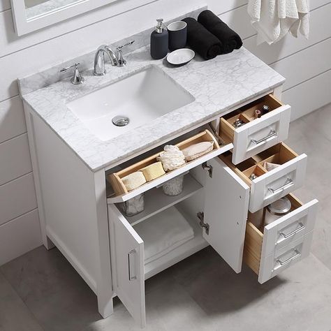 The Tahoe vanity is the perfect solution big storage in a smaller space. Attention to detail and functionality are what really make this piece special. From drawers with built-in organizers to a flip-down front drawer, we made sure to utilize every inch of storage space. The Tahoe is appropriately complimented by modern chrome pulls and soft-close hinges and drawer glides. In addition a large 20” under mount ceramic sink topped with lavish Carrera white marble for a truly astonishing overall ... 36" Vanity, Small Bathroom Vanities, Bad Inspiration, Vanity Storage, Trendy Bathroom, Diy Remodel, Bath Room, Bathroom Renos, Bath Remodel