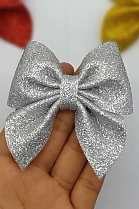 Learn how to make cute Bow with glitter sheets | Easy Bow With Glitter Foamiran Sheets | Make Simple Bow For Christmas | Foam Sheet Craft ideas. #Bow #Christmas #DIYBow Glitter Sheet Decoration Ideas, Glitter Sheet Craft, Glitter Sheets Crafts Ideas, Glitter Foam Sheet Crafts Diy, Foam Paper Crafts, Christmas Hair Bows Diy, Diy Bow Making, Glitter Paper Crafts, Giant Cake