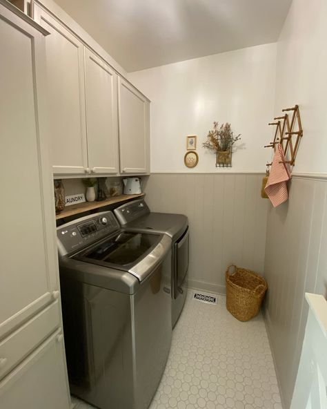 Wainscoting in newly remodeled laundry room. Before And After Laundry Room, Unfinished Laundry Room, Laundry Room Redo, Stenciled Floors, Laundry Inspiration, Ikea Laundry Room, Laundry Room Design Ideas, Used Cabinets, Laundry Room Closet