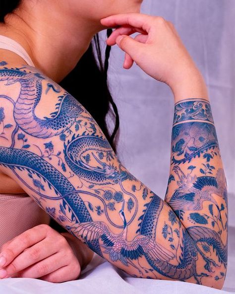 Oozy on Instagram: "Ceramic skin 🔹 . #oozy #oozytattoo #tattoo #dragontattoo" Dragon Tattoo Wrapped Around Arm, Blue Dragon Tattoo, Blue Ink Tattoos, Zelda Tattoo, Dragon Sleeve Tattoos, Full Arm Tattoos, Dragon Tattoos, Blue Tattoo, Shoulder Tattoos For Women