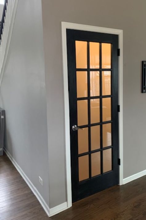 A French door creates openness and an inviting feeling to your finished basement. Glass Door Basement Stairs, Basement Door With Glass, Basement Exterior Door Ideas, Diy Basement Door, Basement Hallway Ideas Stairways, Glass Door To Basement, Basement Stairwell Decorating Ideas, Basement Bedroom Door Ideas, Beadboard Ceiling Basement