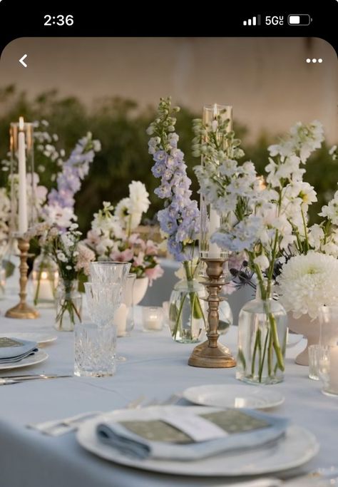 June Wedding Table Settings, Table Decor Lavender, Wedding Flowers Light Purple, Light Blue And White Wedding Table Decor, Wedding Table Decorations Light Blue, Light Blue Purple And White Wedding, Lilac Light Blue Wedding, White Table Cloth Wedding Decor, Blue And White Floral Centerpieces Wedding