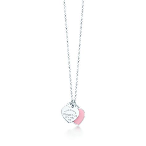 Return to Tiffany™ mini double heart tag pendant in silver with pink enamel finish. | Tiffany & Co. US Colar Tiffany E Co, Tiffany Key Ring, Return To Tiffany Necklace, Pink Heart Necklace, Tiffany Rose, Tiffany And Co Jewelry, Tiffany And Co Necklace, Return To Tiffany, Tiffany Necklace