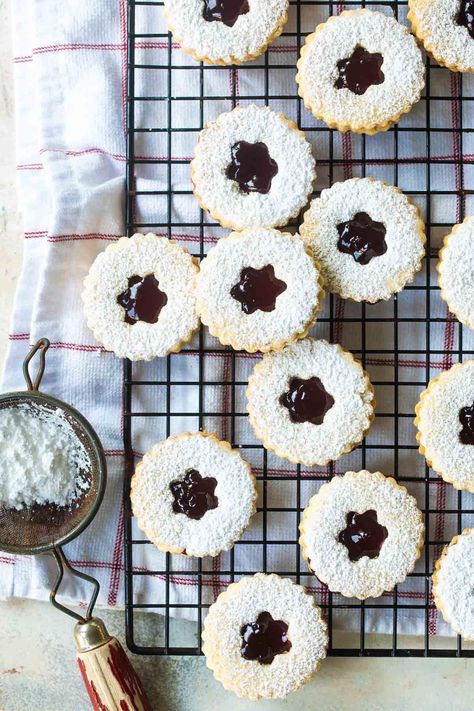 My crisp, buttery Linzer Cookies are about to become your favorite sandwich cookie recipe. With almond-scented cookie dough and a sweet raspberry filling, this classic Christmas cookie recipe will stand out from the cookie swap competition. Lingonberry Jam, Ikea Meatballs, Linzer Cookies Recipe, Cookie Sandwich Recipes, Christmas Cookie Recipe, Sandwich Cookie, Linzer Cookies, Raspberry Almond, Berry Jam