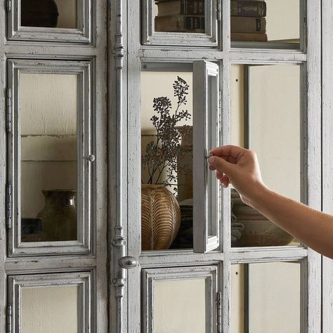 A French-inspired design for our Barbara Cabinet 🤍 This tall, two-tone piece features a distressed grey-blue finish, classic details and subtle distressing throughout. Available at #StyleMeGHD.com Classic Cabinets, Hidden Doors, Two Tone Cabinets, Post Lanterns, Bar Accessories Decor, Outdoor Flush Mounts, Hidden Door, Outdoor Table Settings, Desk And Chair Set