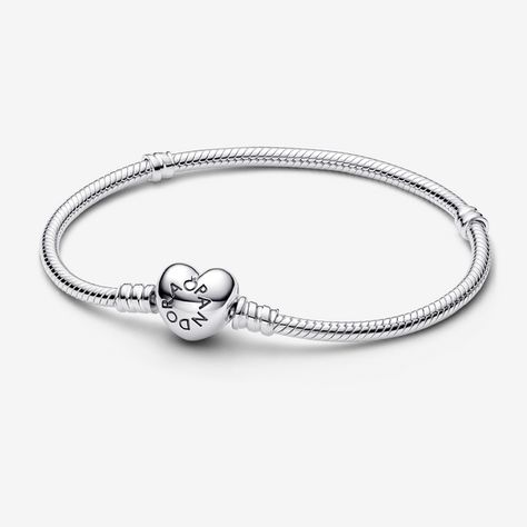 Set your heart a-flutter with this romantic version of Pandora's bestselling charm bracelet. Hand-finished with a heart-shaped clasp, this sterling silver snake chain bracelet looks stunning on its own but even better adorned with your favorite Pandora charms and clips. Layer it with contrasting Pandora chain bracelets for a chic, multi-layered look. - Pandora Moments Heart Clasp Snake Chain Bracelet - Sterling silver - Sz. 9.1 in Pandora Heart Bracelet, Pandora Chain Bracelet, Silver Pandora Bracelet, Pandora Bracelet Silver, Dream Bracelet, Pandora Heart, Charms Pandora, Bracelet Pandora, Pandora Hearts