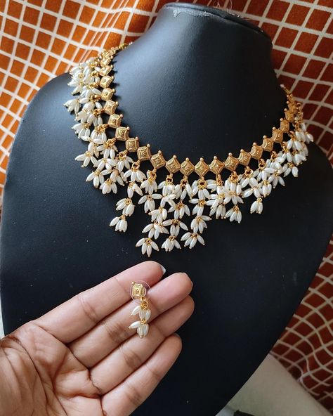 Beautiful Rice Pearl Necklace Rs899/- free shipping To Order Dm @gaanafashion /whatsapp 9035890761 Jewellery, imitation jewellery, southindianjewels, onlinejewellery, online shopping, trending jewellery, bridal jewellery, wedding, jewelry, temple jewellery, necklace, choker, mysorejewels, Kerala jewellery, south indian jewellery, affordable jewellery, matte finish, adstone jewellery, pearl necklace #jewellery #southindianjewellery #onlinejewellery #bridaljewellery #bridal #templejewellerys... Rice Pearls Jewellery Indian, Rice Pearls Jewellery, Temple Jewellery Necklace, Jewellery South Indian, Kerala Jewellery, Rice Pearl Necklace, Trending Jewellery, Pearls Jewellery, Jewellery Pearl