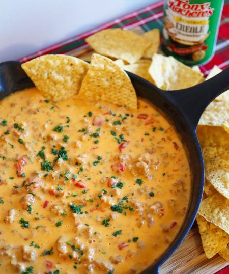 Cajun Sausage Queso Dip | Tony Chachere's Cajun Dip Appetizers, Cajun Cheese Dip, Cajun Rotel Dip, Italian Sausage Queso Dip, Tony Chacheres Recipes, Queso Recipe With Sausage, Cajun Football Food, Cajun Dip Recipes, Tony Chachere Recipes