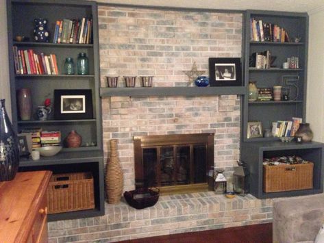 Oak Built Ins Around Fireplace Update, Multi Colored Brick Fireplace, Brick Fireplace Shelves, Brick Fireplace With Black Built Ins, Painted Fireplace Bookcases, Brick Wall Bookshelves, Built In Bookshelves Around Brick Fireplace, Whole Wall Fireplace Makeover, Brick Fireplace Bookshelves