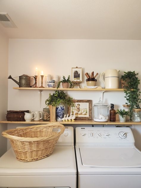 Cottage Farmhouse Laundry Room, Laundry Room Open Shelf Organization, Laundry Nook Ideas Hallways, Old Farmhouse Laundry Room, Renter Friendly Ideas, Cottage Core Laundry Room, Laundry Ideas, Minimal Cottage Core Aesthetic, Cottagecore Aesthetic Laundry Room