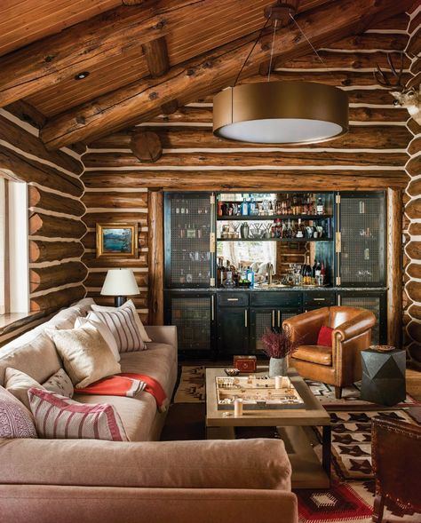 Cowboy Cabin - Big Sky Journal Updated Log Cabin, Tufted Chesterfield Sofa, Log Cabin Interior, Jackson Wyoming, Rock Fireplaces, Island Countertops, Bernhardt Furniture, Style Deco, Cabin Homes