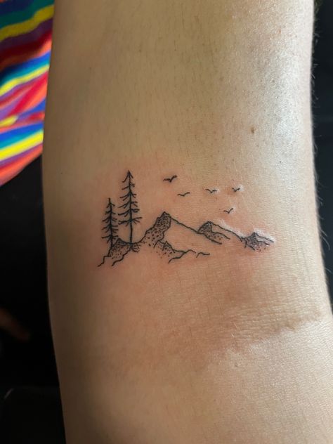 Outdoorsy Tattoos Women, Mountain And Stars Tattoo Simple, Friendship Mountain Tattoos, Life’s A Climb Tattoo, Mountain Tattoo With Trees Simple, Pretty Mountain Tattoos, Women’s Nature Tattoos, Small Mountain Tattoos For Women Forearm, Couple Tattoo Mountain