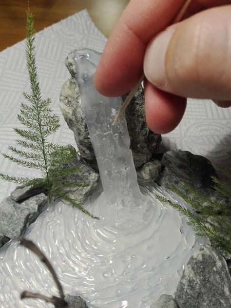 Hot Glue Waterfall, Diy Christmas Village Displays, Diy Waterfall, Dnd Crafts, Mini Waterfall, Rock Fountain, Christmas Tree Village, Christmas Village Accessories, Diy Christmas Village