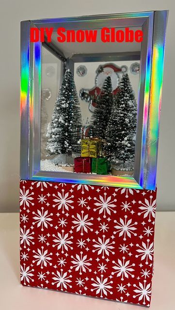 Regal.Impress on Instagram: "I love how this DIY Snow Globe turned out; it’s so cute!! The inspiration came from Roscio Ruiz. She has amazing DIY’s! : : : : : #diycrafts #lifestyleblogger #contentcreator #dollartree #artsandcrafts #christmasdecor #christmas #homedecorideas #crafts #diydecor #creator #holidaydecor" Dollar Tree Christmas Snow Globe, How To Make A Snow Globe, Snow Globe Diy Kids, Interior Christmas Decor Ideas, Diy Christmas Snow Globes, Diy Christmas Snow Globe, Snow Globe Picture Frame, Waterless Snow Globe Diy, Snowglobe Craft