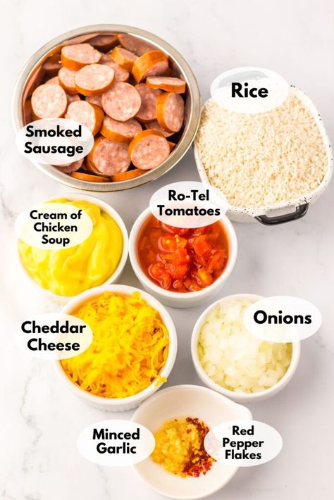 Cheesy Sausage and Rice Casserole Rice Sausage Skillet, Crockpot Meal With Kielbasa, One Pot Smoked Sausage Recipes, Easy Dinner With Sausage Links, Kielbasa And Rice Casserole, Meals With Beef Sausage, Egg Noodle And Sausage Recipes, Sausage Andouille Recipes, Kielbasa And Rice Skillet