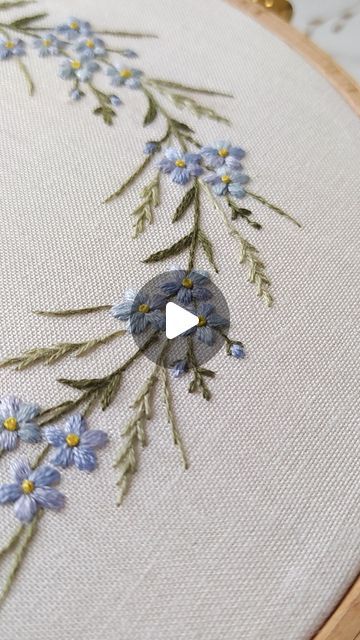 Aliaksandra Dzyachenka on Instagram: "Forget-me-notes. Embroidery process. I used three shades of blue thread here. It think that the flowers come out more alive this way😊. . Save or share if this video was useful for you. . . . PDF-pattern Forget-me-notes Wreath. Available on my Etsy-store. . . . #embroidery #embroiderypattern #dmcthreads #embroiderydesign" Couture, Embroider Forget Me Not, Embroidery Forget Me Not Tutorial, Blue Flower Embroidery Pattern, Embroidered Flower Wreath, How To Embroider Forget Me Nots, Forget Me Not Flower Embroidery, Forget Me Not Flowers Embroidery, Embroidery Flowers Small