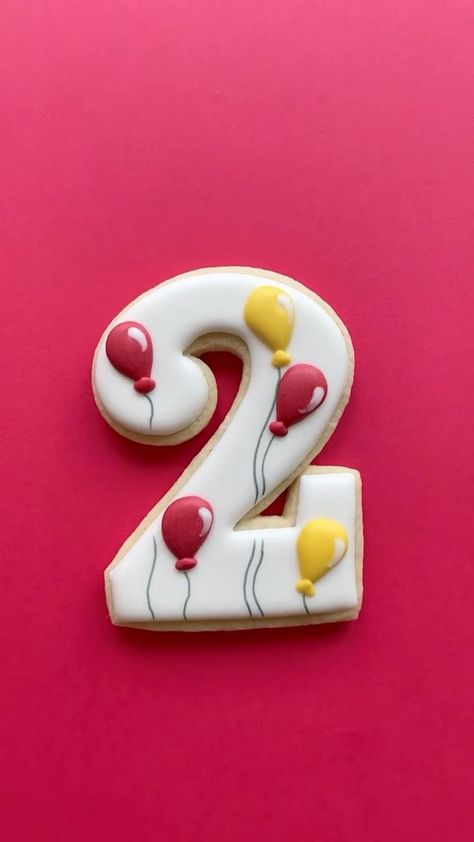 Number two decorated cookie #cookiedecorating #oddlysatisfying #royalicingcookies #baker in 2022 | Cookie decorating, Sugar cookies decorated, Cookie decorating icing Decorating Sugar Cookies, Royal Icing Decorated Cookies, Confetti Cookies, Cookies Royal Icing, Balloon Cookies, Alphabet Cookies, Theme Cookies, Wedding Cake Cookies, Royal Iced Cookies