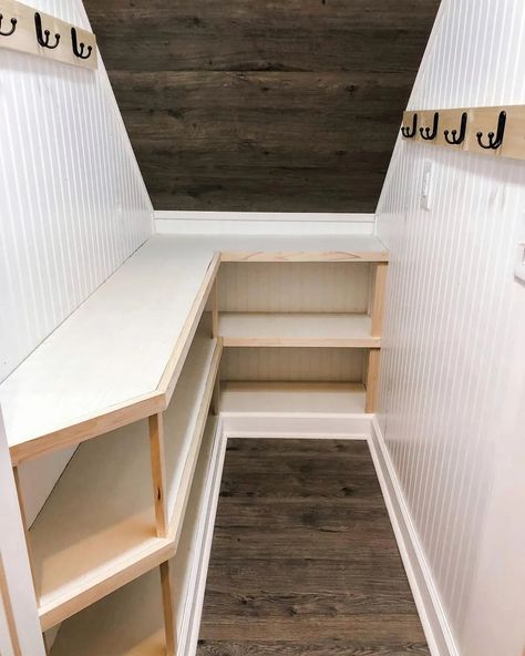 11 Ways To Maximize The Space Under The Stairs – Forbes Home Open Staircase Storage, Kitchen Cupboard Under Stairs, Narrow Under Stairs Storage, Deep Under Stairs Closet, Under Stairs Closet Organization Sloped Ceiling, Under Stairs Pantry Shelving Ideas, Understands Storage, Laundry Under Staircase, Under Stairs Shelving