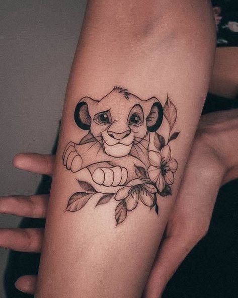 Lion King Tattoo. Girly Disney Tattoos, Disney Tattoos Characters, Hand Tattoos For Women Disney, Lion King Tattoos For Women, Lion King Inspired Tattoos, Disney Animal Tattoo Ideas, Disney Sleeve Tattoos For Women, Small Lion King Tattoo For Women, Cute Cartoon Tattoos For Women