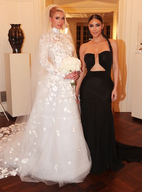 See Kim Kardashian Fluff Paris Hilton's Wedding Dress at Her Nuptials to Carter Reum Paris Hilton Wedding, Kim Kardashian Wedding Dress, Kim Kardashian Wedding, Hilton Wedding, Nicky Hilton, Kyle Richards, Scott Disick, Weddings By Color, Paris Wedding