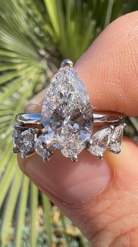 Pairing perfection 🍐 Elevate your love story with our stunning Solitaire Pear Diamond Engagement Ring, beautifully styled with our pear… | Instagram Pear Rings Engagement Wedding Set, Pear Diamond Ring Stack, Pear Solitaire Engagement Ring With Band, Pear Shaped Diamond Wedding Ring, Pear Shaped Engagement Rings And Band, Wedding Band For Pear Shaped Ring, Pear Rings, Diamond Infinity Band, Wedding Ring Pear