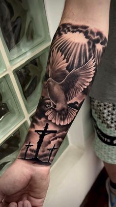 Three Crosses Sleeve Tattoo, Wrist Tattoos Men Sleeve, Cross Crown Tattoo, Memorial Hand Tattoos, Dove Sleeve Tattoo, Religious Forearm Tattoo, Religous Tattoo Arm Sleeve, Christian Arm Tattoo, Forearm Tats Men