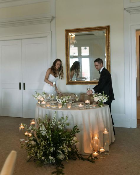 ✍️ Tuesday Tips ✍️ Do you want a special spot for just the two of you on your wedding day? A private sweetheart table separate from your guests and Reception is perfect for couples craving a little intimate moment away from the crowd. Enjoy some quiet time, share a few laughs, and soak in the love without any distractions! Coordination & Design: @mdpevents Photographer: @ellas.moments Florist: @victoriabloomssrq Venue: @concessionwed DJ: @ghamobiledjs Jazz Duo: @breezinentertainment Chair... Wedding Table For Couple, Lovers Table Wedding, Wedding Decor Without Flowers, Minimal Sweetheart Table, Couple Table Wedding, Bride And Groom Reception Table, Couples Wedding Table, Living Room Wedding Ceremony, Bride And Grooms Table