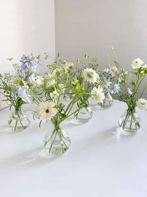 Blue Simple Wedding Decor, Delicate Flower Centerpiece, Bud Vases With Eucalyptus, Blue Flower Bud Vase, Blue Wildflower Centerpieces, Simple Blue And White Bouquet, Bud Vase Blue Flowers, Flower In Small Vase, Flower Center Piece For Tables Simple