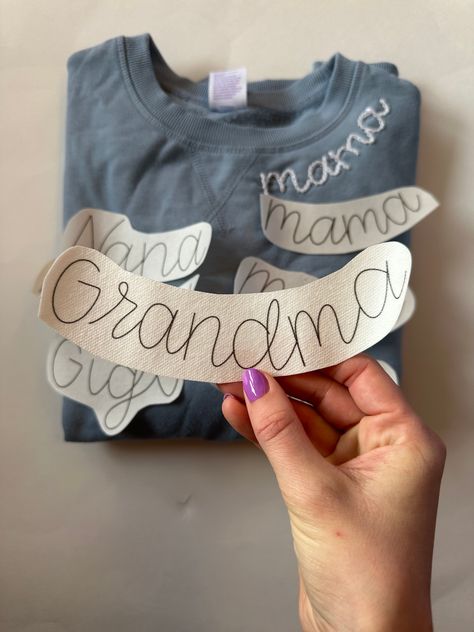 The Grandma neckline design allows you to create your very own Grandma sweatshirt. Celebrate the loving Grandma in your life with a personalized sweatshirt she can wear with pride! Our stick and stitch patterns are hand drawn and designed by Jessy, created to help you create beautiful hand embroidered pieces. These patterns can be used to embroider: Clothing items (sweatshirts, t-shirts, denim, onesies, etc) Hats Canvas bags and book bags Pillows Napkins Hoop art And more!! This listing includes Grandm Gifts, Sweatshirt Designs Embroidery, Embroderie Gifts, Diy T Shirt Embroidery Ideas, Embroidery Stick And Stitch, Embroidered Grandma Sweatshirt, Hand Embroidery Applique, Iron On Patches Ideas Clothes Diy, Pink Embroidery Designs